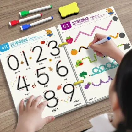 Child learning numbers and shapes with workbook.